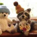Carol's hats on Michele's bear and racoon